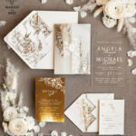“Golden Shine Wedding Invitation Suite: Acrylic Glamour for Luxury Gold Wedding Cards”