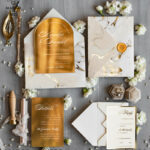 “Introducing our Arch Gold Acrylic Wedding Invitation – A Luxurious and Glamorous Ivory Suite with Gold Marble Accents”