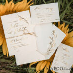 Exquisite and Personalized: Elegant Custom Wedding Cards with a Touch of Gold and Nude
Elevate your Wedding with Bespoke Glamour: Golden Nude Wedding Invitations for a Luxurious Celebration
Romantic Charm meets Simple Elegance: Customized Minimalistic Wedding Stationery that Sets the Tone