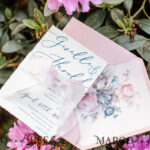 “Timeless Elegance: Vintage Floral Wedding Invitations with Bespoke Watercolor Designs and Hand Dyed Ribbon”