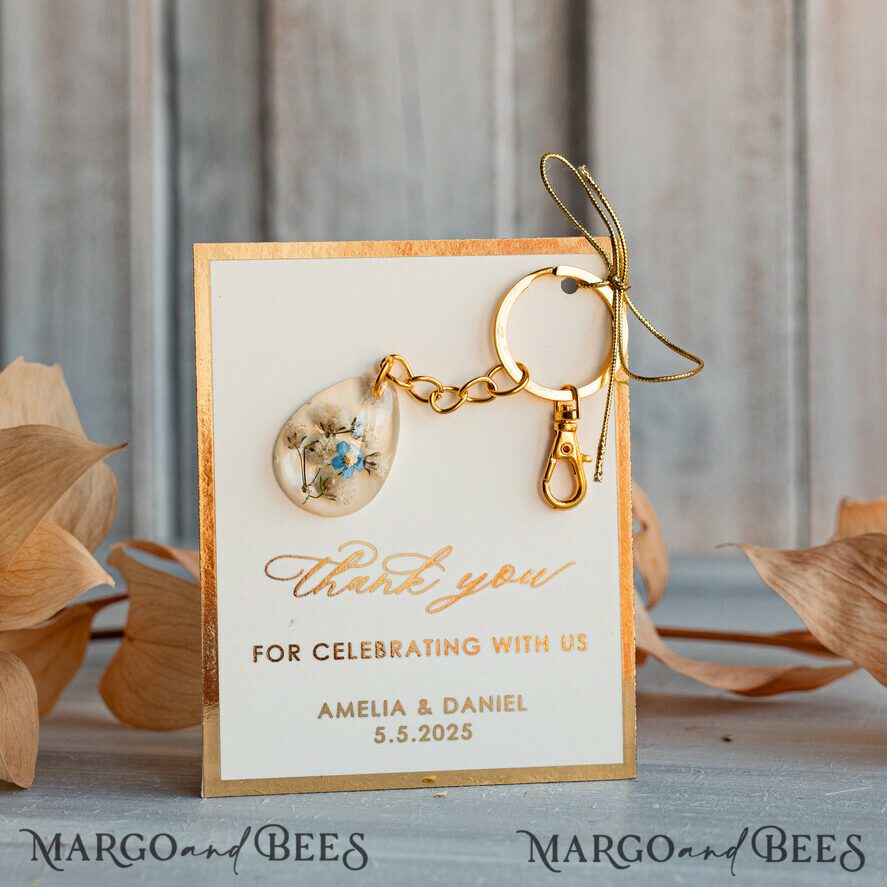 Gold Keychain Wedding Favors: Teardrop Design with Blue Flower and Ivory Card with Golden Edges