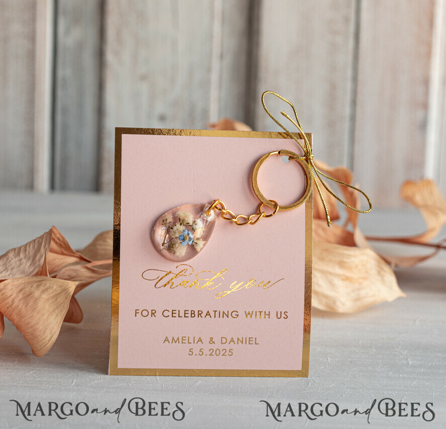 Gold Keychain Wedding Favors: Teardrop Design with Blue Flower and Pink Card