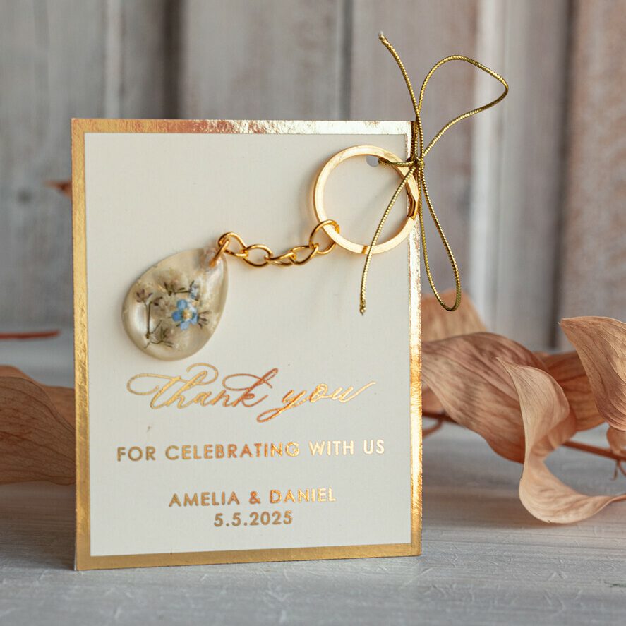 Gold Keychain Wedding Favors: Teardrop Design with Blue Flower