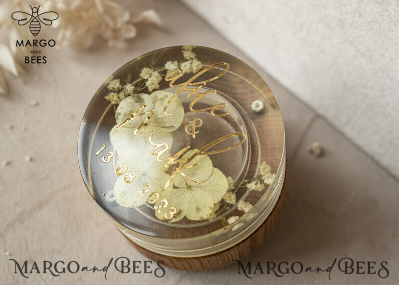 Handcrafted Epoxy Resin and Wood Wedding Ring Box for Ceremony: A Perfect Blend of Elegance and Nature
Boho Epoxy Wedding Ring Boxes: His and Hers, Uniquely Beautiful
Transparent Epoxy Double Ring Box for Wedding: A Symbol of Love in Clear View
Wood Resin Flowers Marriage Proposal Ring Box: A Whimsical Touch to Your Special Moment-26