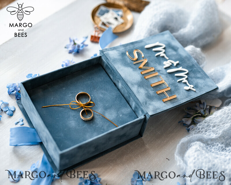 Dusty Blue and Golden Velvet Wedding Ring Box: A Perfect Ceremony Essential for Your Special Day

Elevate Your Wedding Ceremony with a Luxurious Dusty Blue and Golden Velvet Ring Box, Perfect for Holding 3 Rings

Add a Touch of Boho Glam to Your Wedding with His and Hers Velvet Ring Boxes

Customize Your Luxury Velvet Ring Box with Double the Elegance and Choose Your Preferred Colors-1