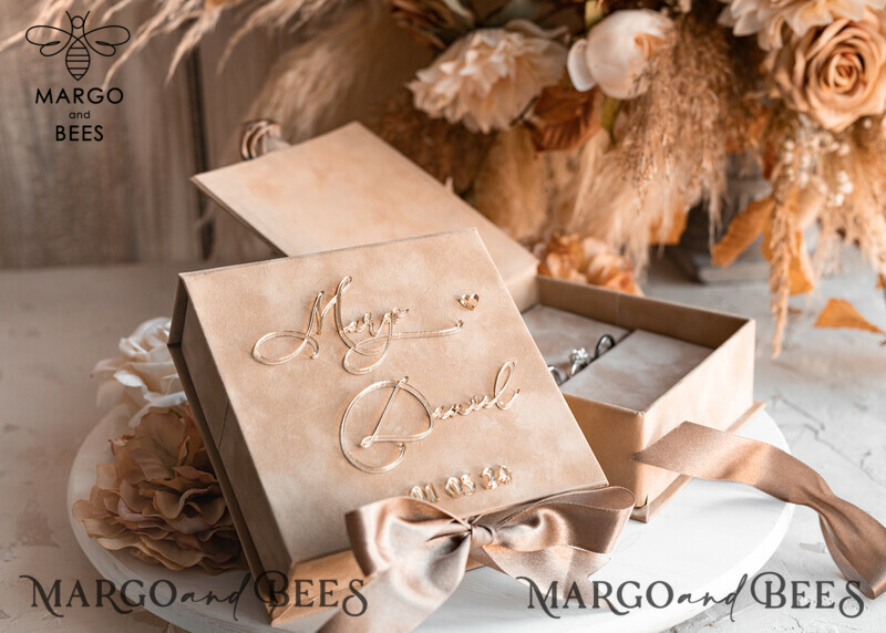 Beige Golden Velvet Wedding Ring Box: A Luxurious Choice for Your Ceremony

Nude Ring Box for Wedding Ceremony: Showcase Your Rings in Style

Add a Touch of Elegance with Boho Glam Wedding Ring Boxes for His and Hers

Luxury Velvet Ring Box Double: Customize Your Colors for a Personalized Touch-0