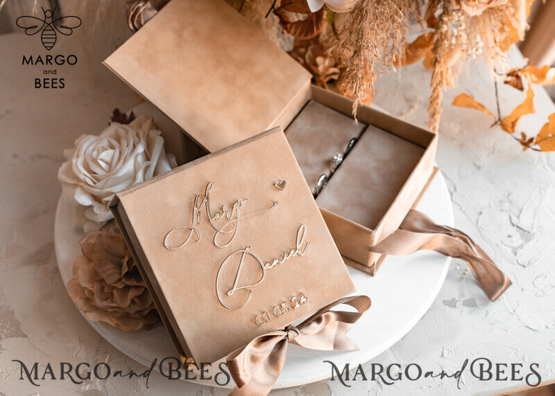 Beige Golden Velvet Wedding Ring Box: A Luxurious Choice for Your Ceremony

Nude Ring Box for Wedding Ceremony: Showcase Your Rings in Style

Add a Touch of Elegance with Boho Glam Wedding Ring Boxes for His and Hers

Luxury Velvet Ring Box Double: Customize Your Colors for a Personalized Touch-3